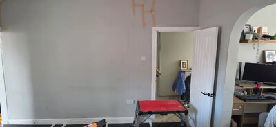 Smooth plaster finish in a hallway renovation