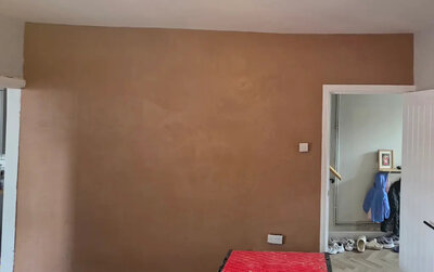 Plastered alcove and chimney breast finish