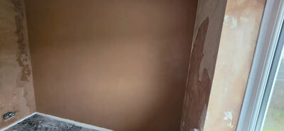 Fresh plaster finish drying before painting