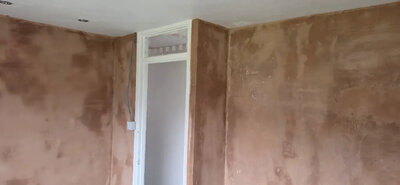 Smooth wall plaster finish in a bedroom