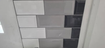 Large format floor tiles in a hallway