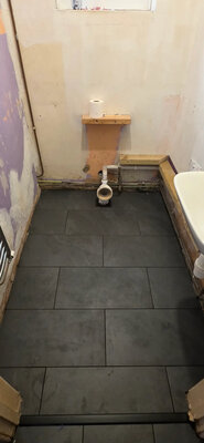 Herringbone pattern tile installation