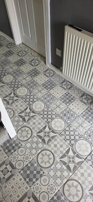 Neutral tone bathroom tiling finish
